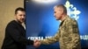 Президент України Володимир Зеленський і новопризначений голова Служби зовнішньої розвідки України Олег Іващенко (праворуч) під час представлення його колективу СЗР. Київ, 28 березня 2024 року