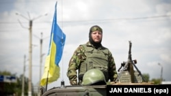 Ілюстративне фото. Український воїн у Дебальцеві, 31 липня 2014 року 