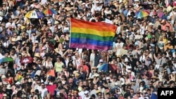 People take part in the Budapest Pride parade in the Hungarian capital on June 28.