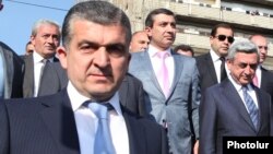Armenia - President Serzh Sarkisian (R) and his chief bodyguard Vachagan Ghazarian (L), Yerevan, April 14, 2012. 
