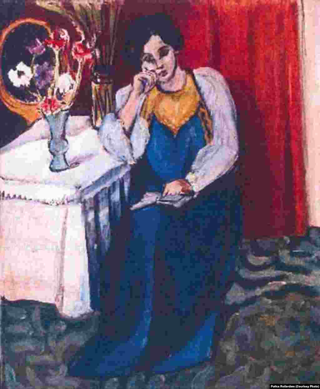 Matisse-nin 1919-cu ildə çəkdiyi “Ağ və sarı geyinmiş oxuyan qız” əsəri. Rotterdamda Kunsthal muzeyindən oğurlanıb. 