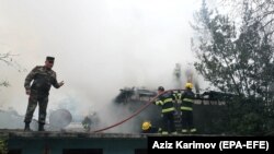 AZERBAIJAN -- Firefighters battle the fire after a shelling in the city of Barda, October 5, 2020