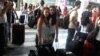Armenia - Newly arrived Syrian Armenian children at Yerevan's Zvartnots airport, 9Aug2012.