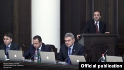 Armenia -- Justice Minister Hrayr Tovmasian addresses a cabinet meeting, Yerevan, 15Dec2011.