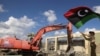 U.K. Warns Against Sheltering Qaddafi