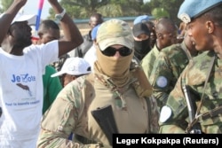 Russian soldiers, believed to be Russia's wagner Group are seen providing security to Prsident Faustin-Archange Touadera