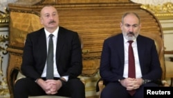 Russia - Azeri President Ilham Aliyev and Armenian Prime Minister Nikol Pashinyan are seen during a visit to the Catherine Palace in Saint Petersburg, December 26, 2023. 