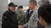 Леон Панетта в Центре транзитных перевозок, 13 марта 2012. 