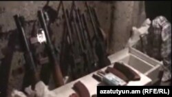 Armenia - A screenshot of police video of an arms cache discovered in Yerevan on 29Feb2012.