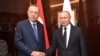 Президенты России и Турции - Владимир Путин (справа) и Реджеп Тайип Эрдоган