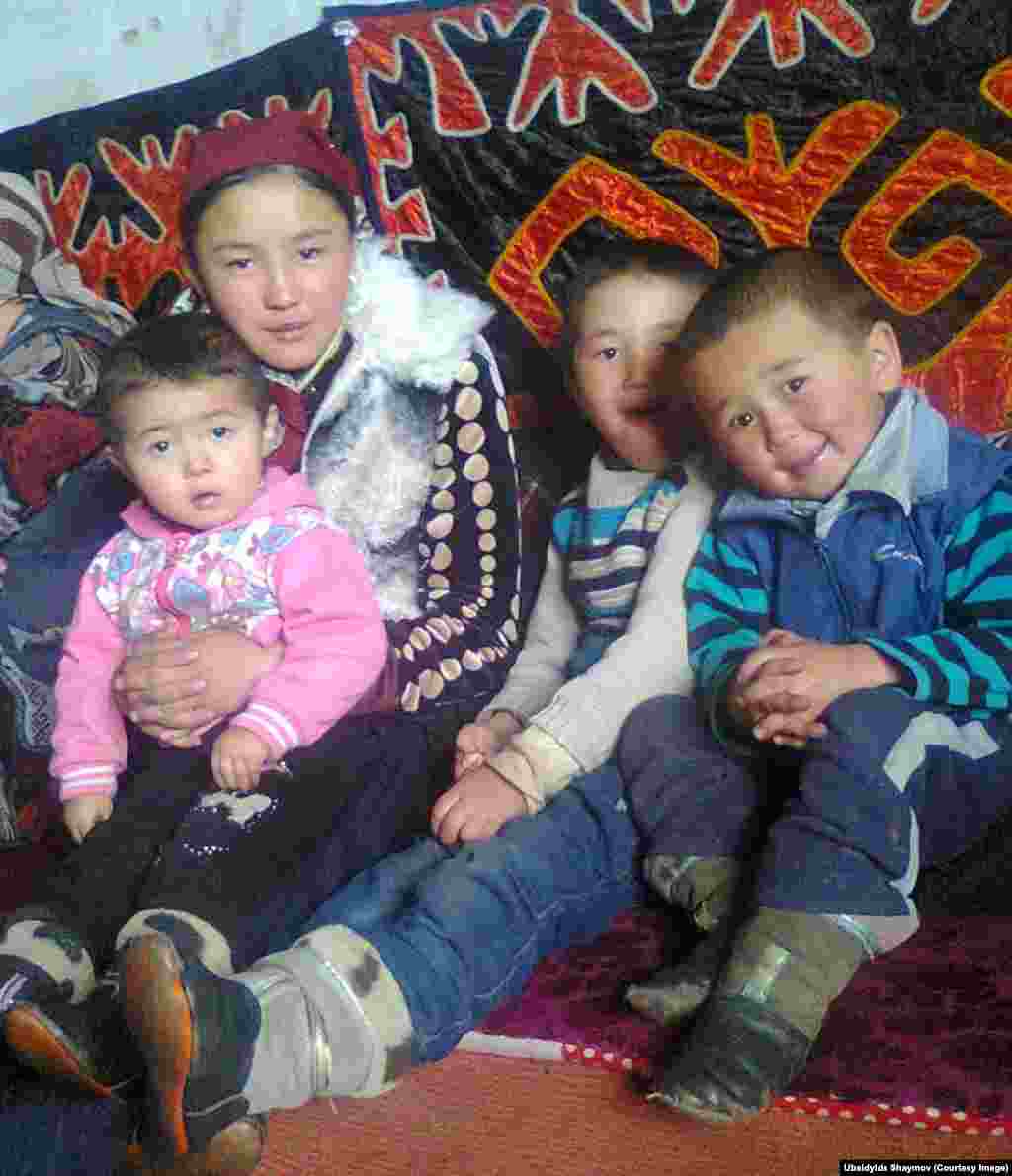 Tajikistan -- Talant, first from right, with other kids, Murghab, 4 December 2014