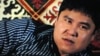 Учитель физкультуры Омар Сункар является режиссером, сценаристом и исполнителем роли криминального авторитета Багды. Кадр из фильма «Регион 13».