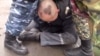 Скриншот видео о предполагаемом насилии над заключенными в казахстанской колонии.