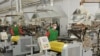 Armenia -- Workers at a manufacturing enterprise in Yerevan.
