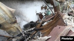 Разрушенный в результате ракетного удара дом в Карабахе