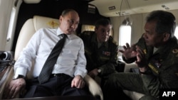 Орусиянын президенти Владимир Путин, коргоо министри Сергей Шойгу, Башкы штабдын жетекчиси Валерий Герасимов