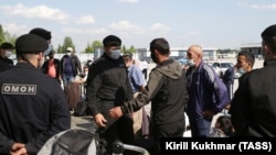 Орусиядагы борбор азиялык мигранттар. Иллюстрациялык сүрөт.