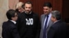 Пратеникот Павле Богоевски носи маица за поддршка на СЈО на конститутивната седница на парламентот