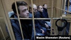 Богдан Небилиця і троє українських військових на засіданні суду в Москві