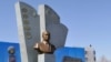 Turkmenistan -- Members of the Uzbek diaspora in Turkmenistan attend a ceremony unveiling a monument to Uzbek late president Islam Karimov in Turkmenabat, March 7, 2017